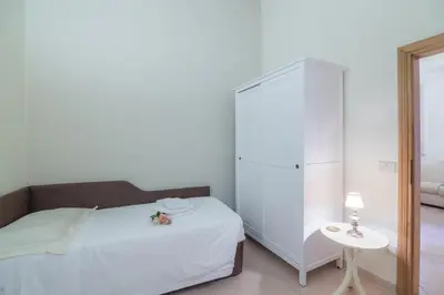 Letto o letti in una camera di Pontormo by Mmega