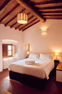 Letto o letti in una camera di Agriturismo Fattoria Poggio di Fiesole