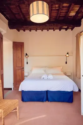 Letto o letti in una camera di Agriturismo Fattoria Poggio di Fiesole
