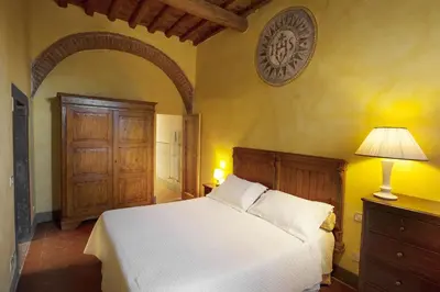 Letto o letti in una camera di La Capannaccia