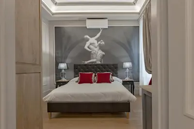 Letto o letti in una camera di Apartments Florence - Teatro Luxury