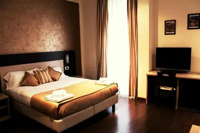 Letto o letti in una camera di B&B Marbò Florence