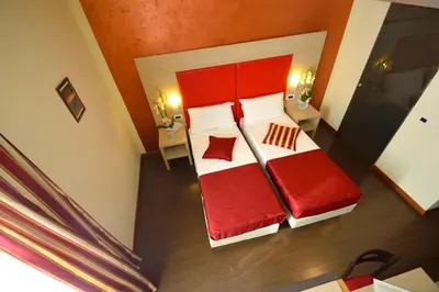 Letto o letti in una camera di B&B Marbò Florence