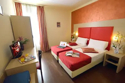Letto o letti in una camera di B&B Marbò Florence