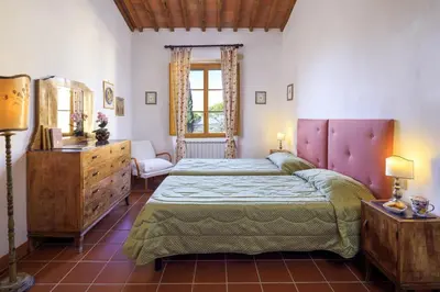 Letto o letti in una camera di Agriturismo Fattoria Santo Stefano