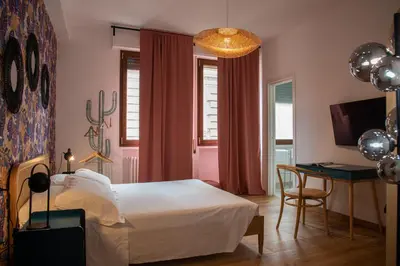 Letto o letti in una camera di B&B La Marmora 39