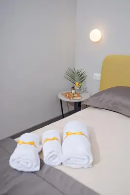 Letto o letti in una camera di Palazzo Gherardi Apartments