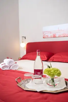 Letto o letti in una camera di Palazzo Gherardi Apartments