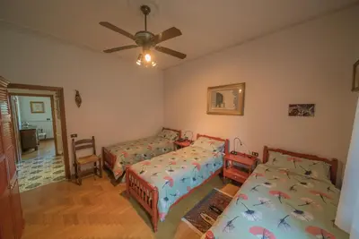 Letto o letti in una camera di VILLA IL TRUFOLO