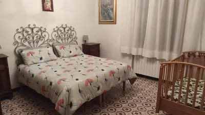 Letto o letti in una camera di VILLA IL TRUFOLO