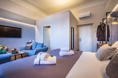 Letto o letti in una camera di Palazzo dei Conti Residenza d'Epoca