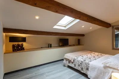 Letto o letti in una camera di GuestHost - Le stanze di Carla! Con cucina e bagno privato