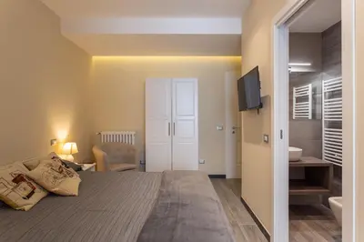Letto o letti in una camera di GuestHost - Le stanze di Carla! Con cucina e bagno privato