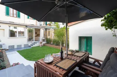 Giardino di GuestHost - Le stanze di Carla! Bagno privato, cucina in comune