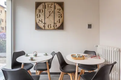 Area soggiorno di GuestHost - Le stanze di Carla! Bagno privato, cucina in comune