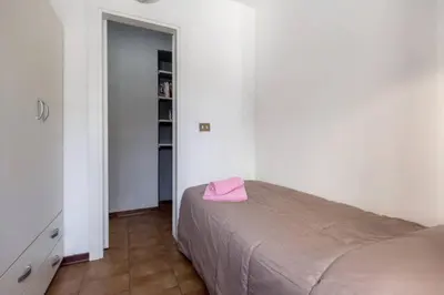 Letto o letti in una camera di AL COLLEGIO, Centro Storico