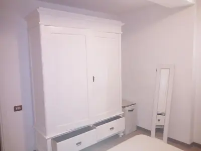 Letto o letti in una camera di AL COLLEGIO, Centro Storico