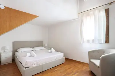 Letto o letti in una camera di Appartamento La Terrazza Firenze centro storico