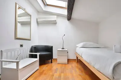 Letto o letti in una camera di Appartamento La Terrazza Firenze centro storico