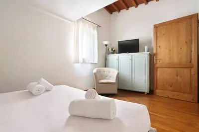 Letto o letti in una camera di Appartamento La Terrazza Firenze centro storico
