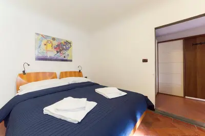 Letto o letti in una camera di David Museum 6 sleeps apartment