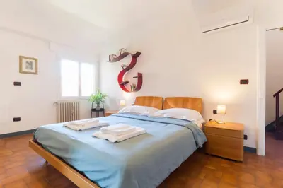 Letto o letti in una camera di David Museum 6 sleeps apartment