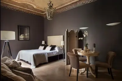 Letto o letti in una camera di Palazzo Branchi