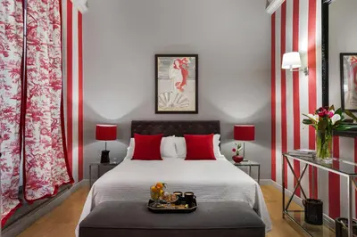 Letto o letti in una camera di Palazzo Branchi