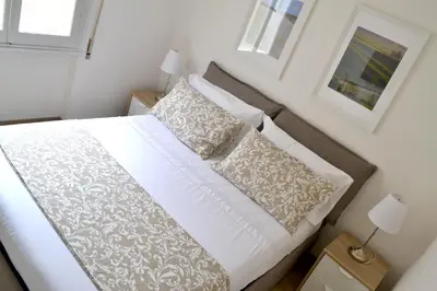 Letto o letti in una camera di Modarno Exclusive Apartments
