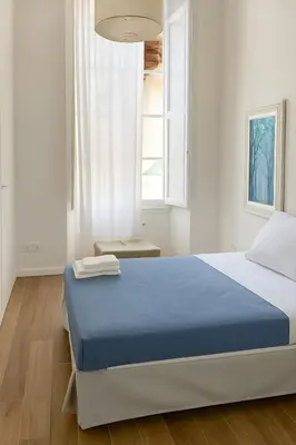 Letto o letti in una camera di Santa Rosa Florence Apartments 3 Bedrooms - Private Parking