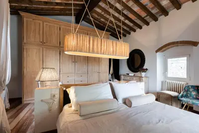 Letto o letti in una camera di Casa Belvedere Firenze