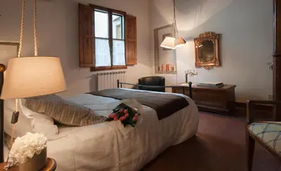 Letto o letti in una camera di Yome - Your Home in Florence