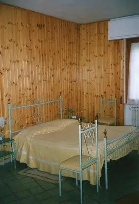 Letto o letti in una camera di Albergo Padellino