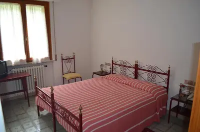 Letto o letti in una camera di Albergo Padellino