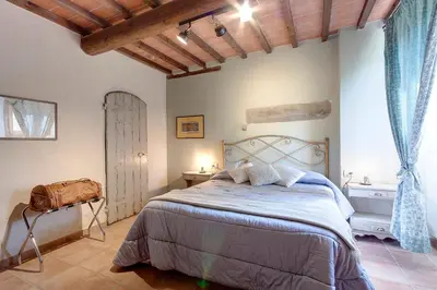 Letto o letti in una camera di Podere Vignola