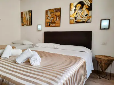Letto o letti in una camera di Residenza Martin