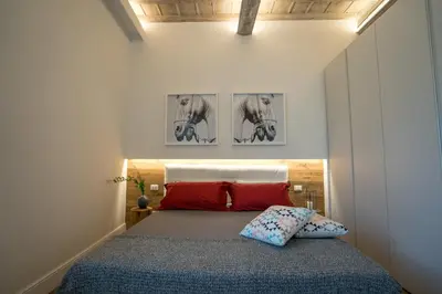 Letto o letti in una camera di Olive Loft