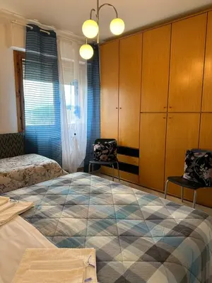 Letto o letti in una camera di Dario's House