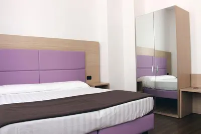 Letto o letti in una camera di Hotel Esperanza
