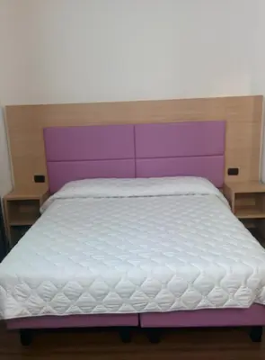 Letto o letti in una camera di Hotel Esperanza