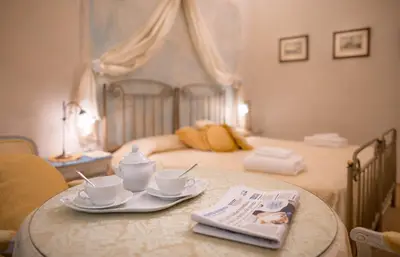 Letto o letti in una camera di Novella House