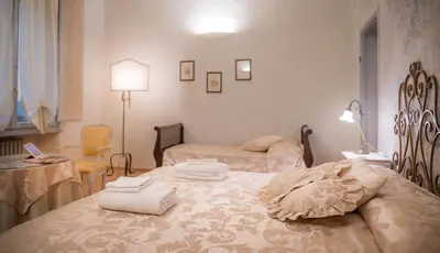 Letto o letti in una camera di Novella House
