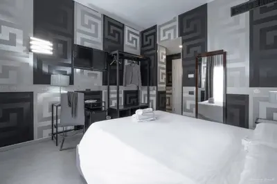 Letto o letti in una camera di Hotel Deco