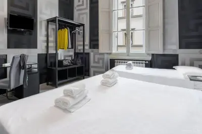 Letto o letti in una camera di Hotel Deco