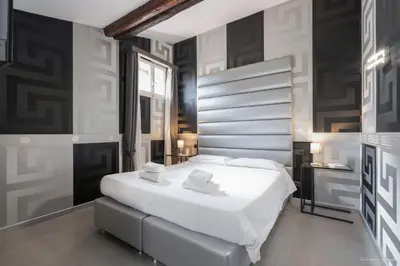 Letto o letti in una camera di Hotel Deco