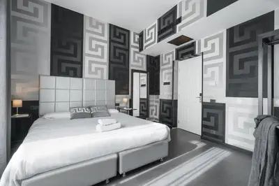 Letto o letti in una camera di Hotel Spagna