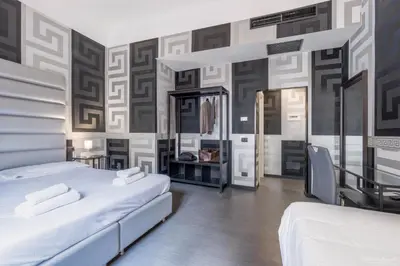 Letto o letti in una camera di Hotel Spagna