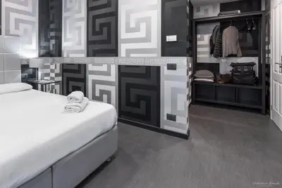 Letto o letti in una camera di Hotel Spagna
