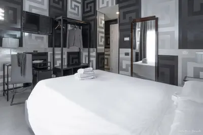Letto o letti in una camera di Hotel Spagna