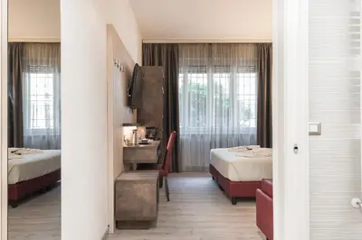 Letto o letti in una camera di Le Nove Muse Guesthouse